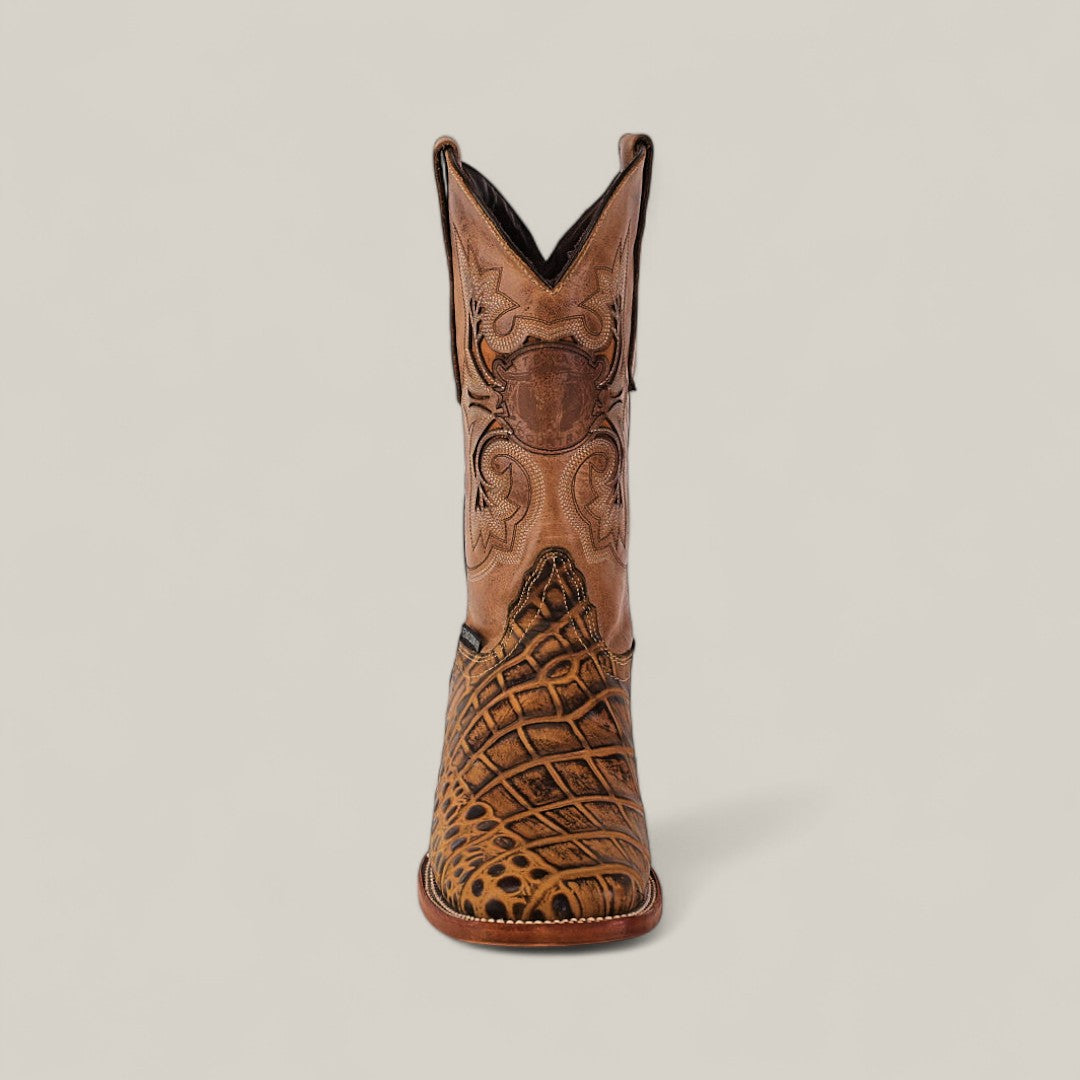 The Jonh - Orix - Square Toe is a single brown premium leather cowboy boot featuring intricate shaft stitching and a textured, scale-like foot pattern, displayed upright against a plain light background.