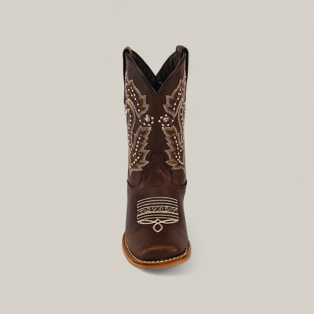A single Britany Brown - Square Toe - Kids Boot featuring white and tan stitching with decorative patterns on the shaft and toe, displayed upright against a light background to highlight its quality craftsmanship.