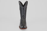 The Exotic Ostrich - Black - Narrow Square Toe boot is shown from the front against a white background, showcasing its textured leather, high shaft, brown sole, and signature narrow square toe design.