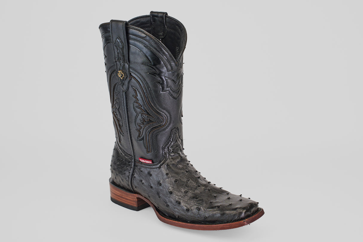 The Exotic Ostrich - Black - Rodeo Toe boot, shown solo on a light gray background, features decorative stitching, a pointed toe, and a stacked wooden heel—ideal for adding classic western flair.