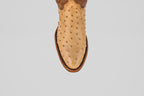 The Exotic Full Quilt Ostrich - Orix features tan ostrich leather with round toe, brown welt stitching, and full quill bumps—showcasing handcrafted Western quality. Photographed from above on a white background.