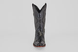 The Tanner - Black - Round Toe cowboy boot, shown front-facing on a plain light background, features intricate stitching and a textured reptile-like pattern in Python Negro Oval leather.