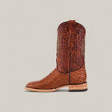 The Python Print Rustic Cogñac - Square Toe boot features a brown python print pattern and decorative stitching, displayed in profile against a plain light background.