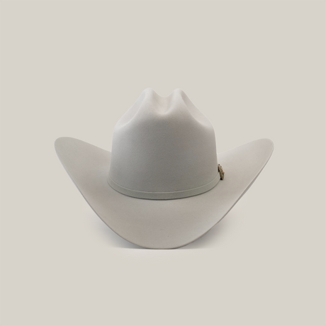 The 500X Superior Platinum cowboy hat is a luxury Western accessory featuring a wide brim and creased crown, crafted from premium belly beaver fur in plain white.