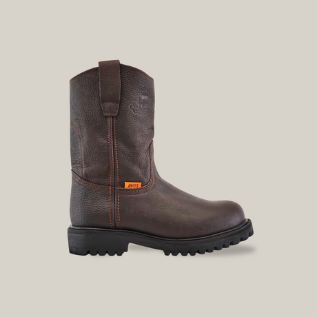 The Brown Roper features premium cowhide leather with a strong tractor sole and soft toe, displayed on a plain white background. It has a pull-on tab and orange stitching accents, showcasing style and durability.